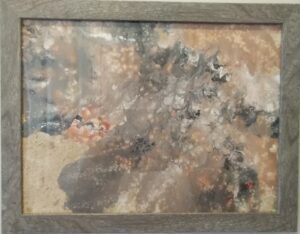 A closeup look at a painting with different colors and textures.